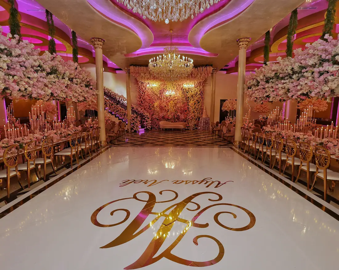 Mirror dance floor and floral ballroom at Arelis Celebration Hall