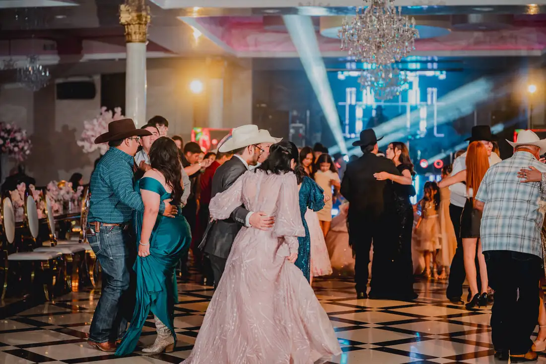 Guests dancing on the checkered dance floor at The Grand Villa, Rio Grande Valley