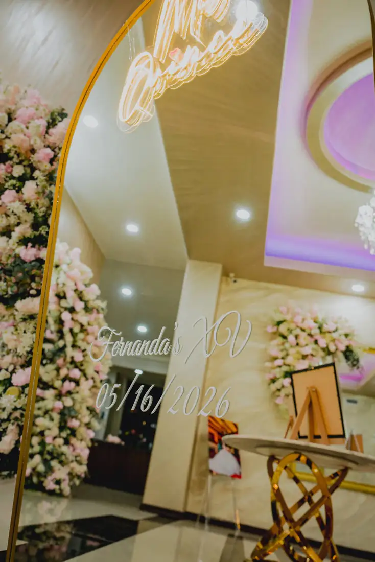 Cherry blossom archway entrance inside The Grand Villa event venue